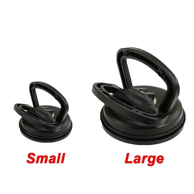 Effortlessly Remove Dents with Our 2-Inch Black/Orange Suction Cup Car Repair Tool