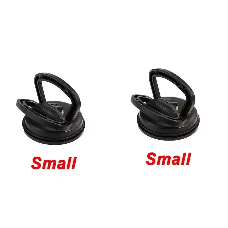 Effortlessly Remove Dents with Our 2-Inch Black/Orange Suction Cup Car Repair Tool