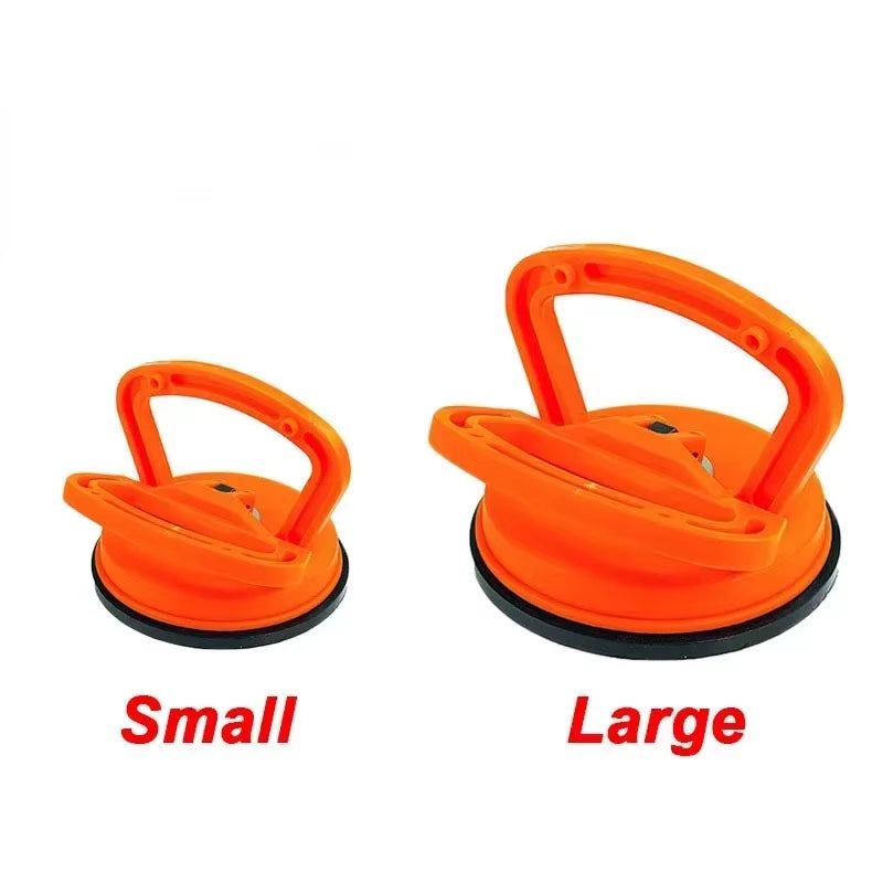 Effortlessly Remove Dents with Our 2-Inch Black/Orange Suction Cup Car Repair Tool